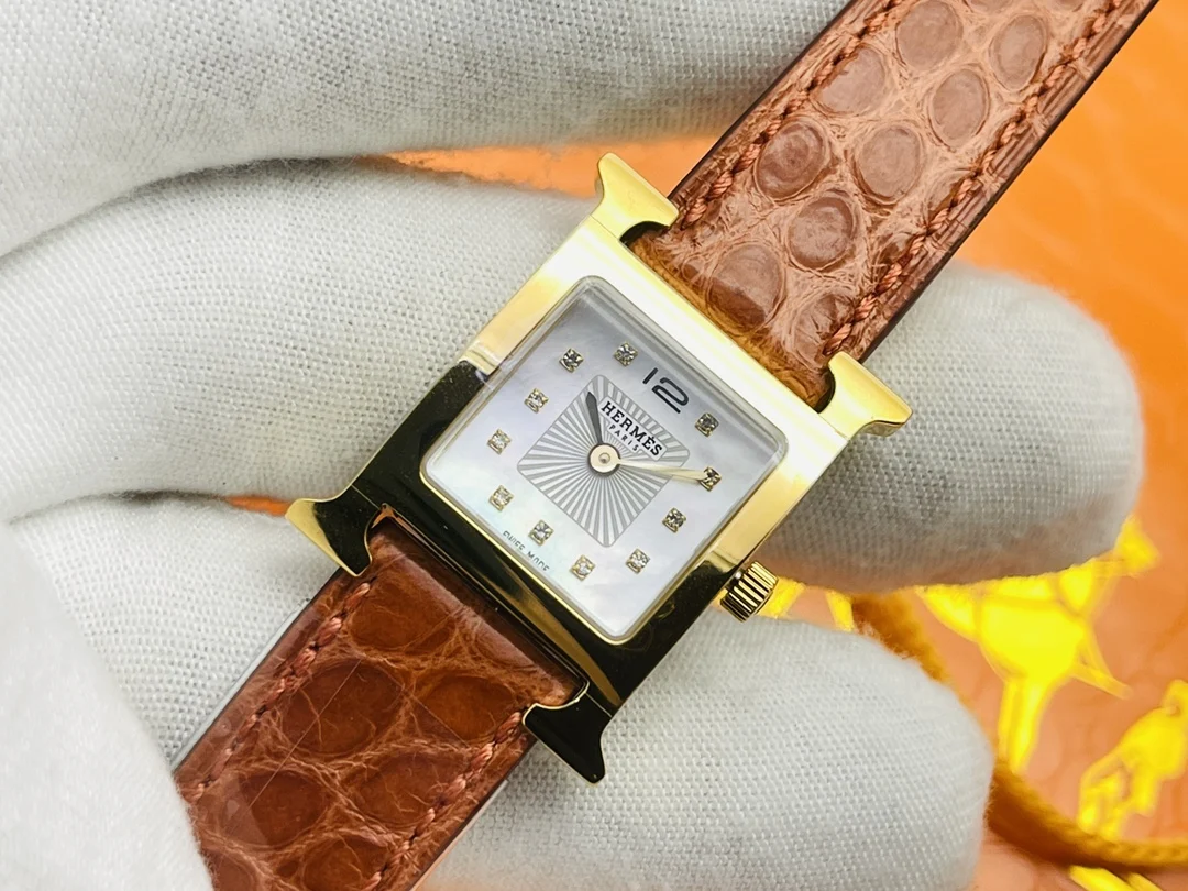 Hermès Steel Red Dial — photographed off the sweep
