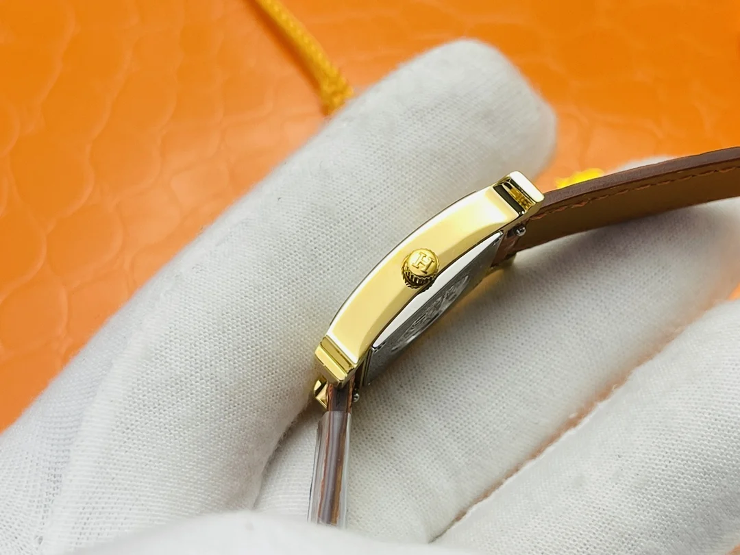 Hermès Steel Red Dial — photographed off the sweep