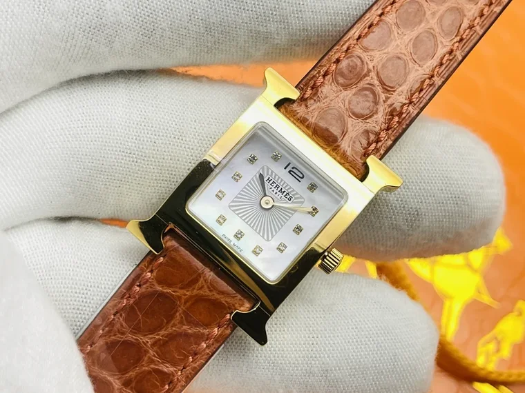 Hermès Steel Red Dial