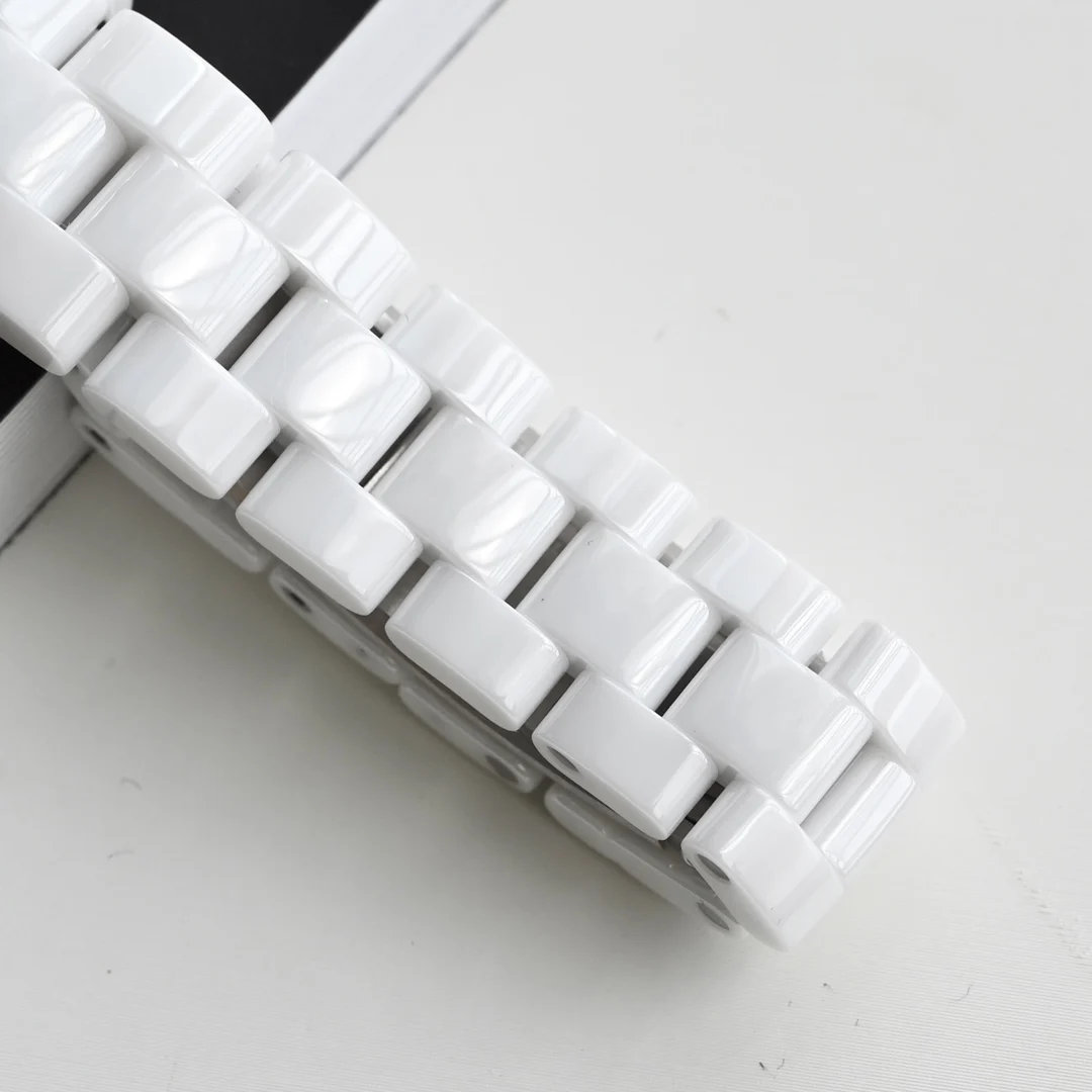 Imported from South Korea, this precision ceramic strap — photographed off the sweep