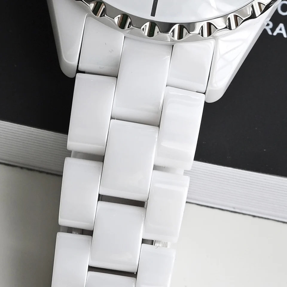 Imported from South Korea, this precision ceramic strap — photographed off the sweep