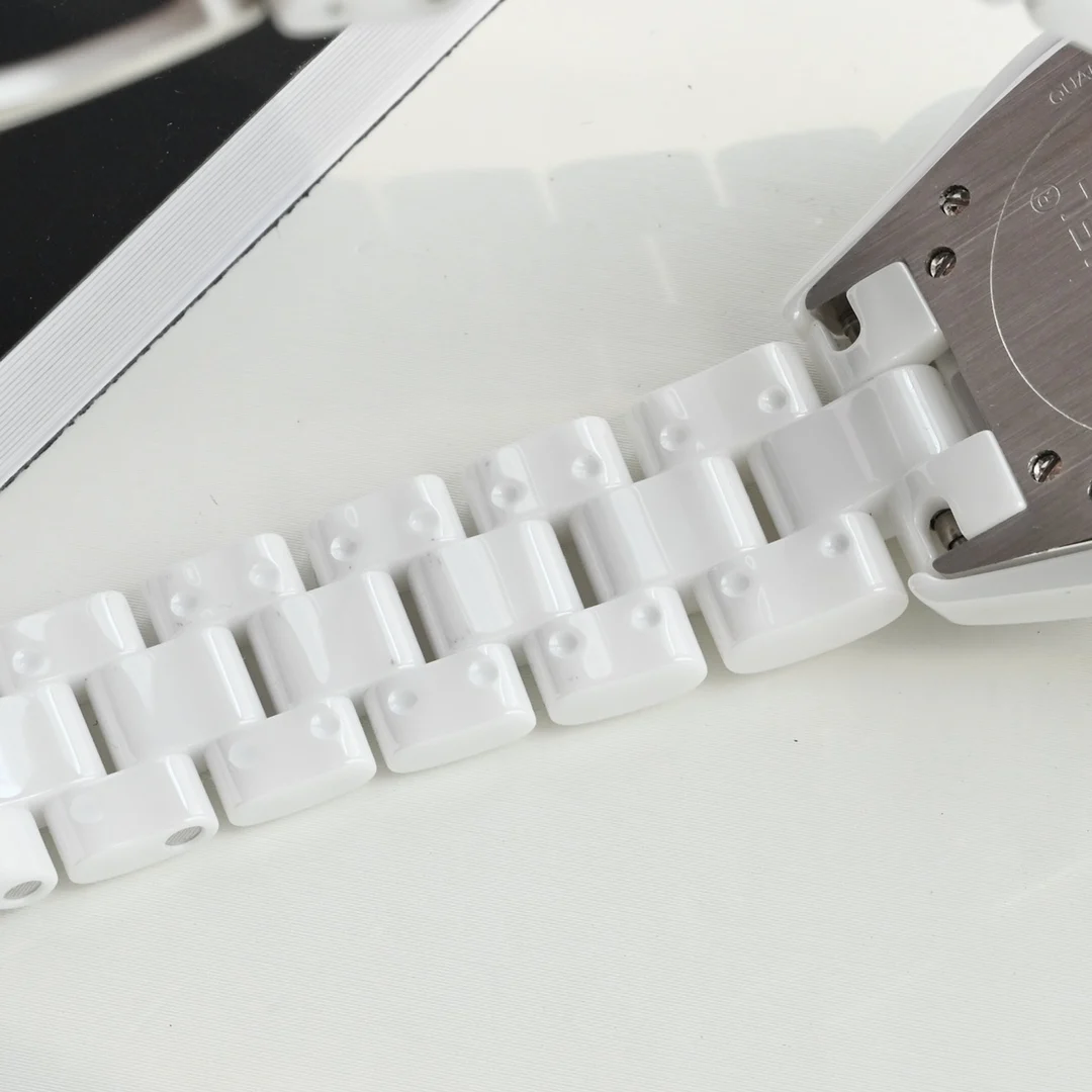 Imported from South Korea, this precision ceramic strap — photographed off the sweep
