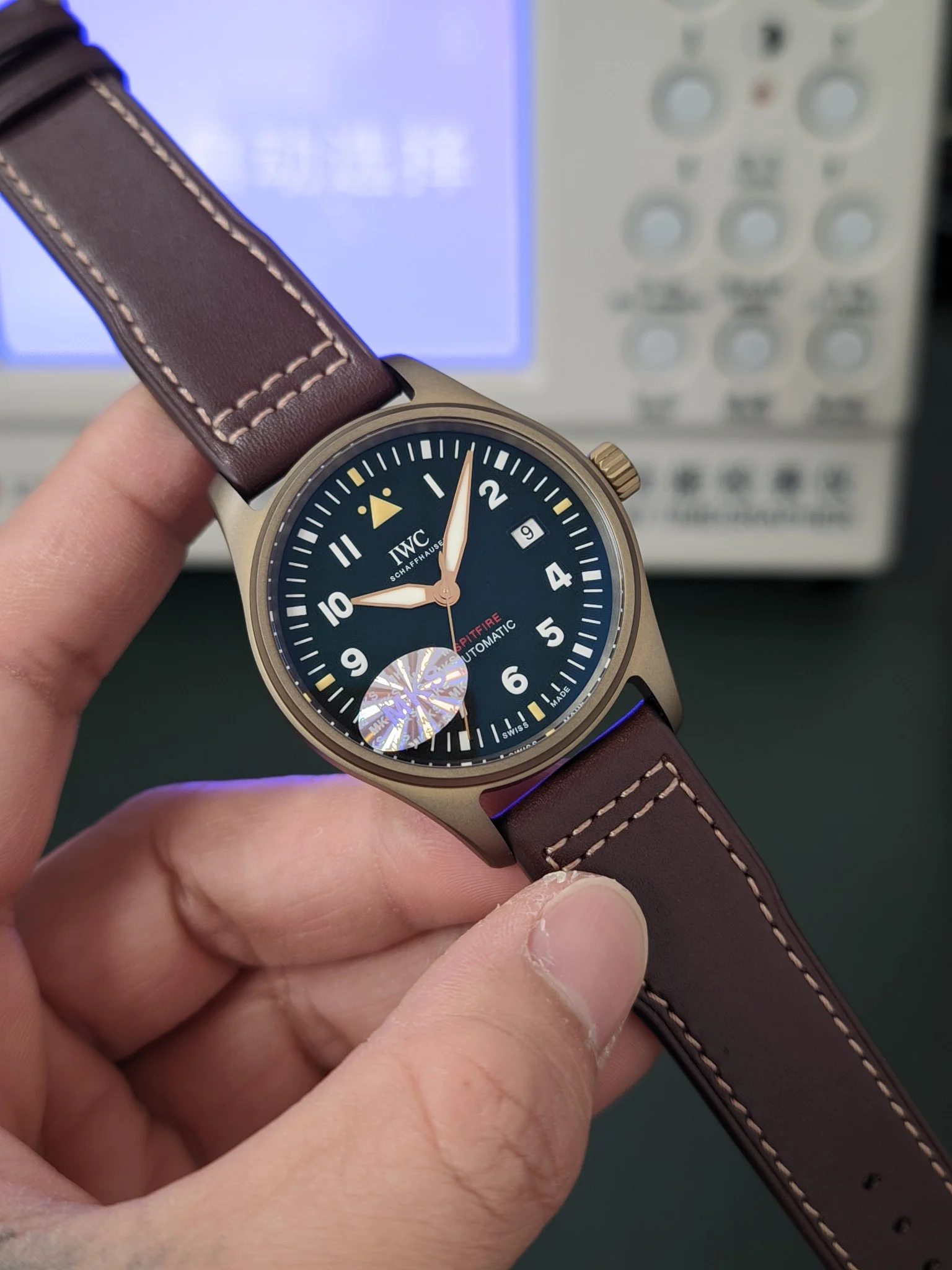 IWC Pilot Titanium Green Dial 39mm — photographed off the sweep