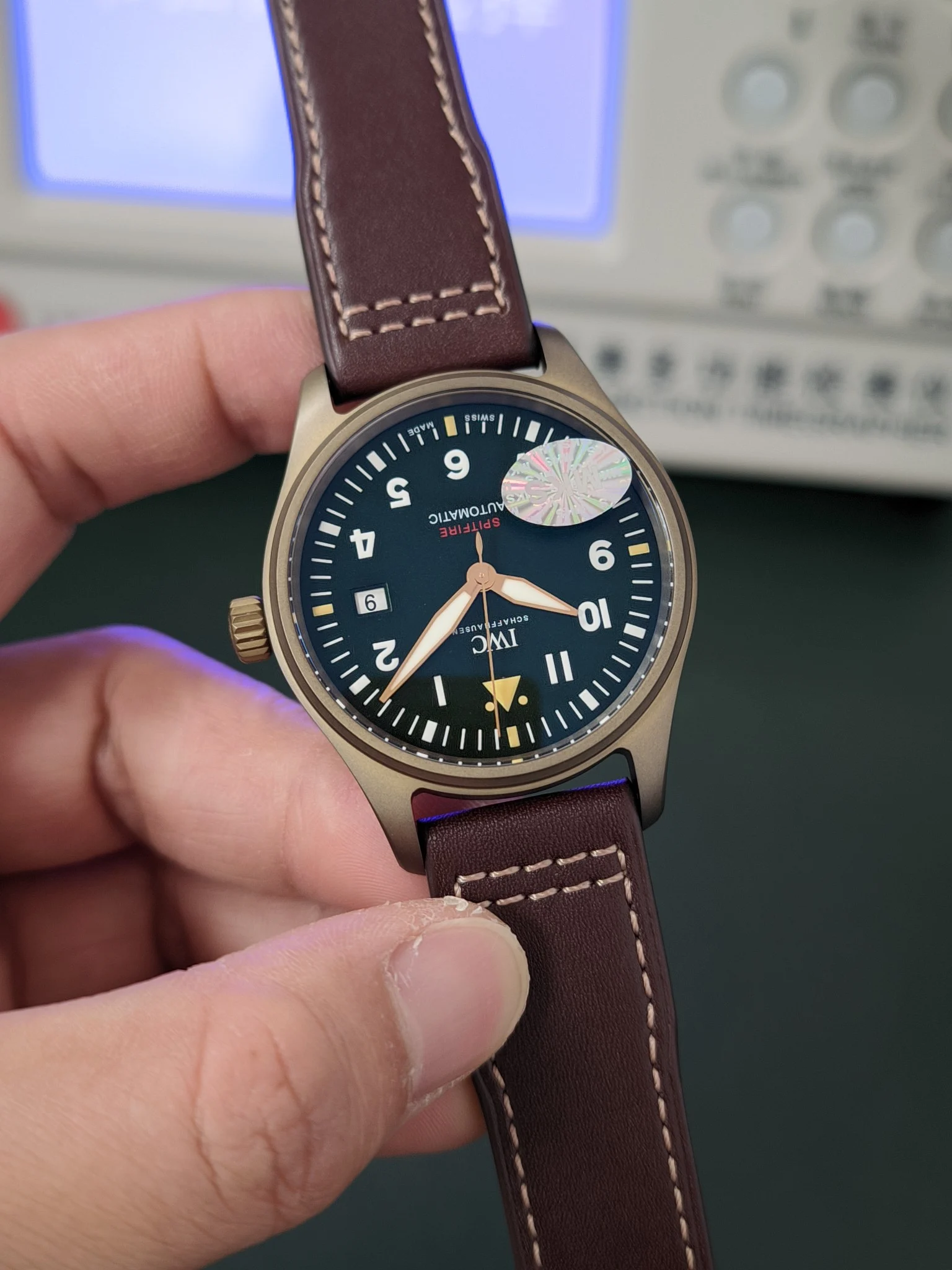 IWC Pilot Titanium Green Dial 39mm — photographed off the sweep