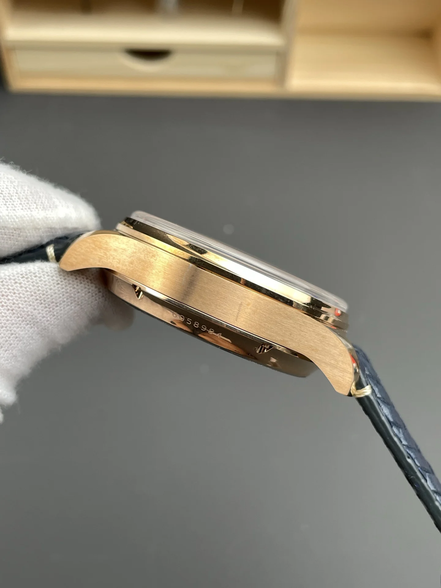 IWC Portugieser Perpetual Calendar Rose Gold Blue Dial — photographed off the sweep