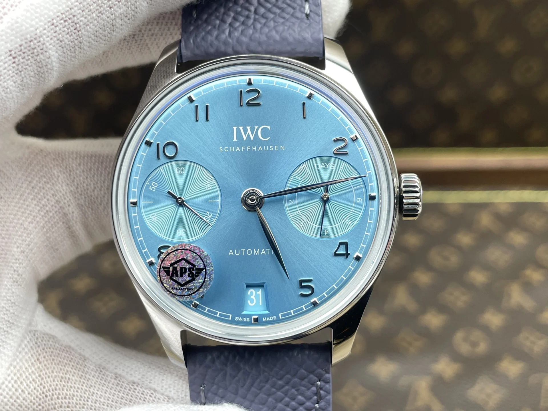 IWC Portugieser Red Dial 42.4mm — photographed off the sweep