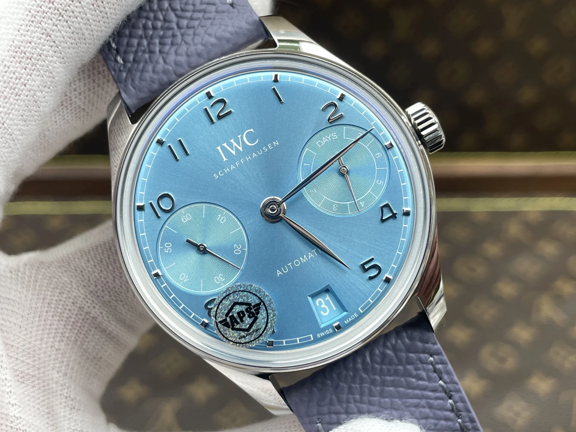 IWC Portugieser Red Dial 42.4mm — photographed off the sweep