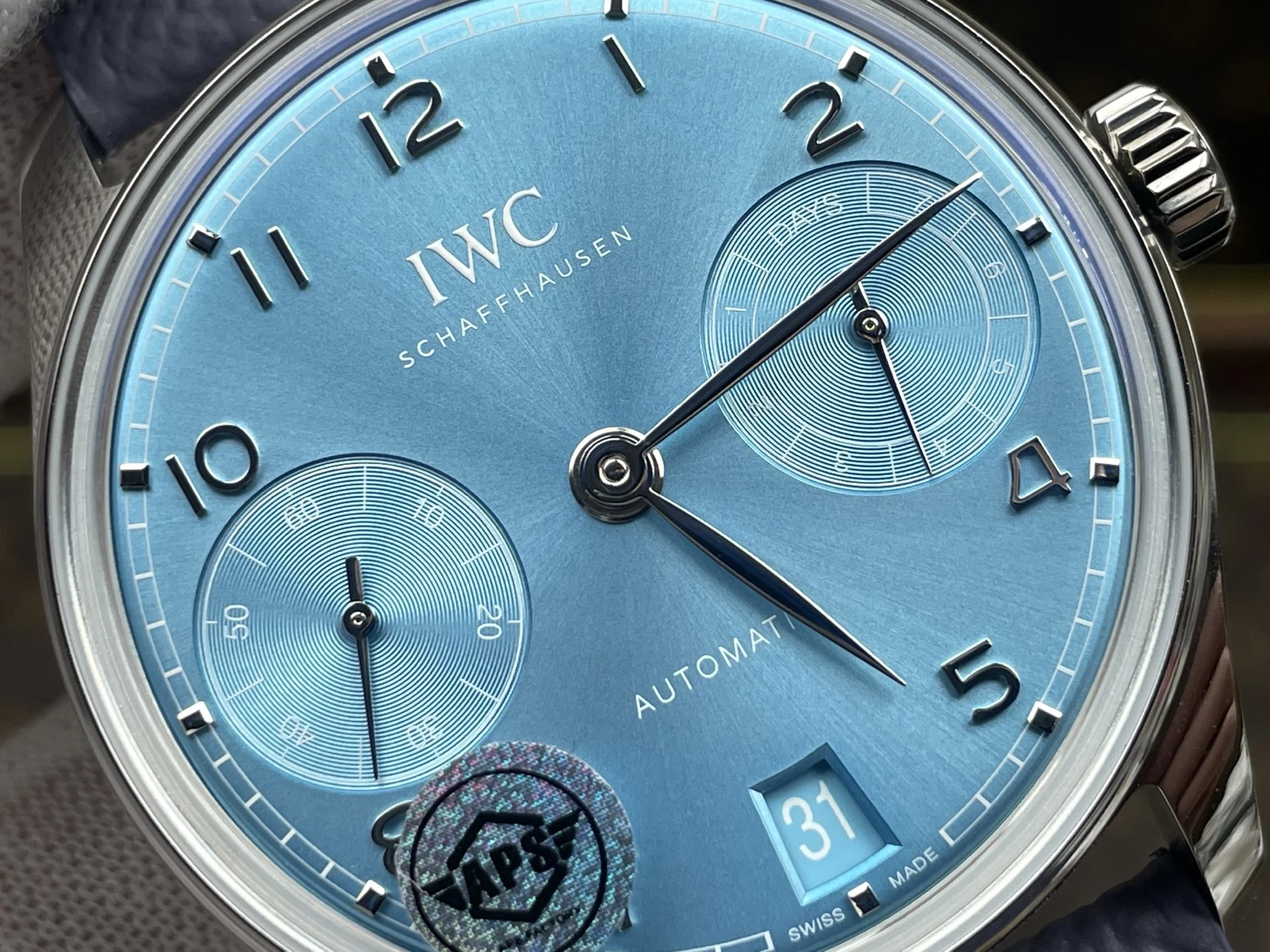IWC Portugieser Red Dial 42.4mm — photographed off the sweep