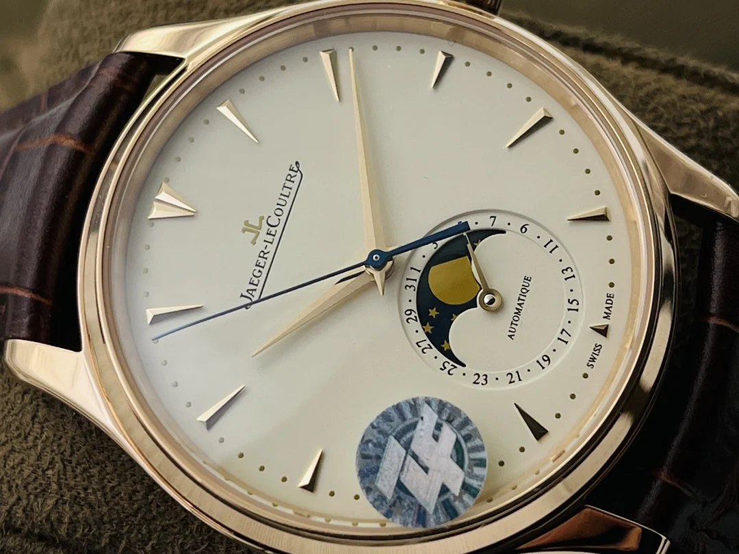 Jaeger-LeCoultre Moon Phase Rose Gold Red Dial 39mm — photographed off the sweep