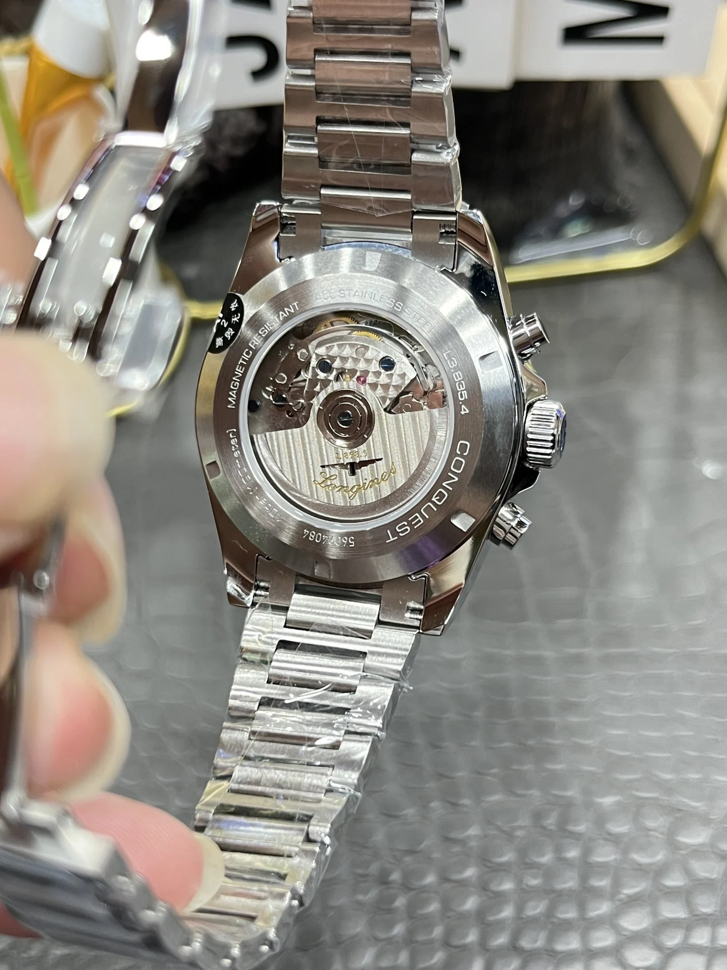Longines Conquest 42mm — photographed off the sweep