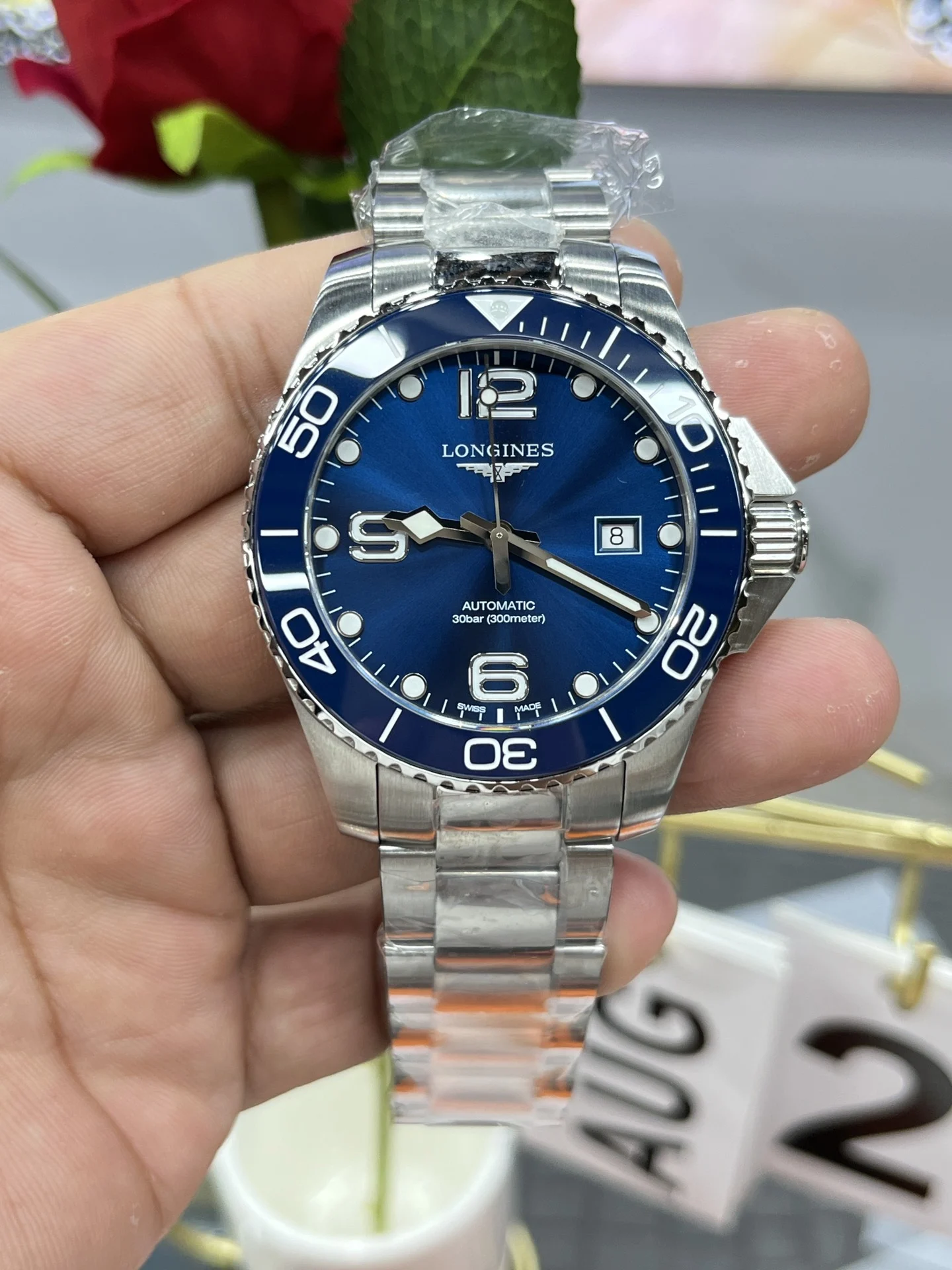 Longines Conquest 43mm — photographed off the sweep
