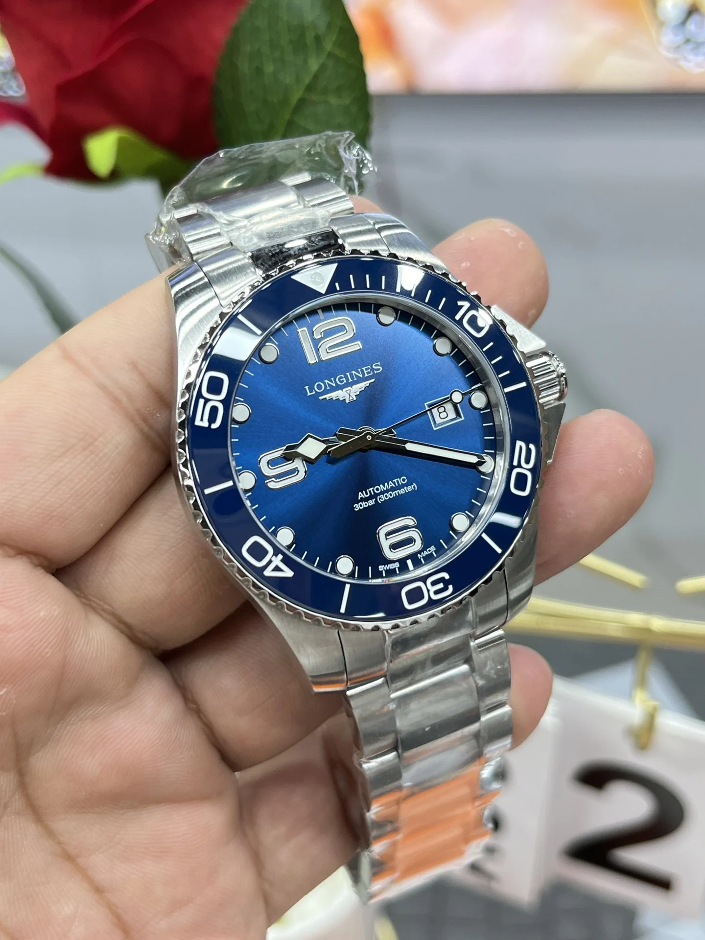 Longines Conquest 43mm — photographed off the sweep