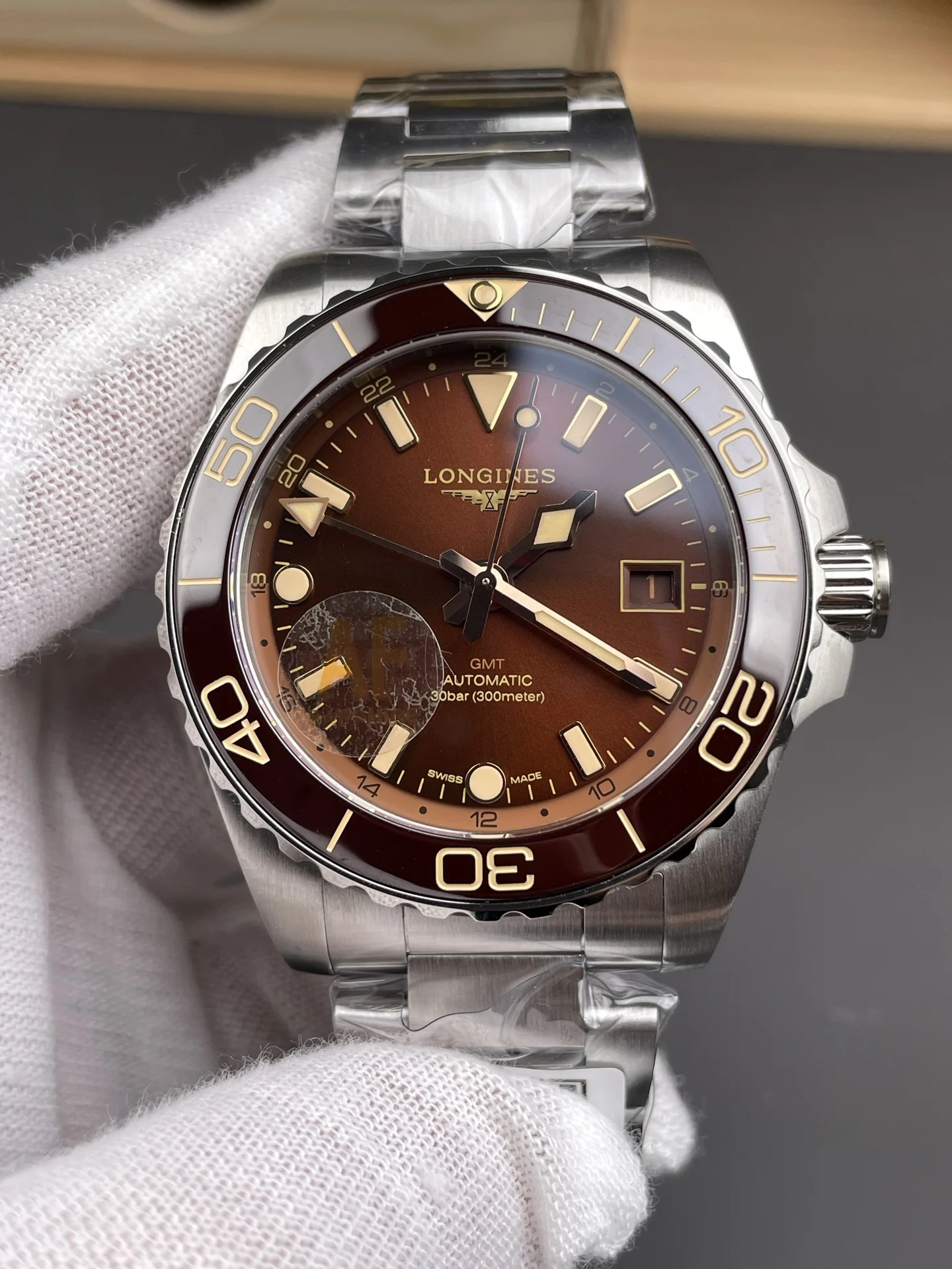 Longines Conquest Brown Dial — photographed off the sweep