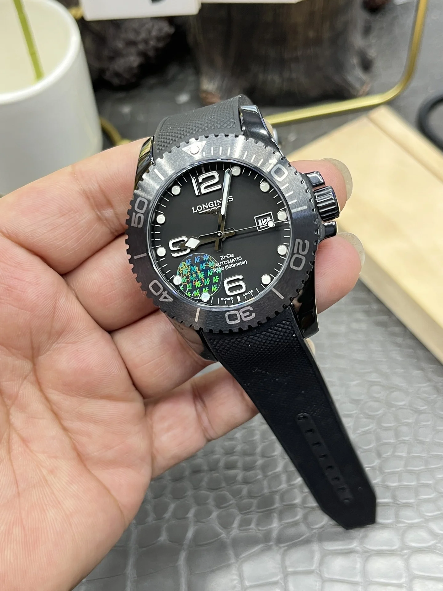 Longines Conquest Ceramic Black Dial 43mm — photographed off the sweep