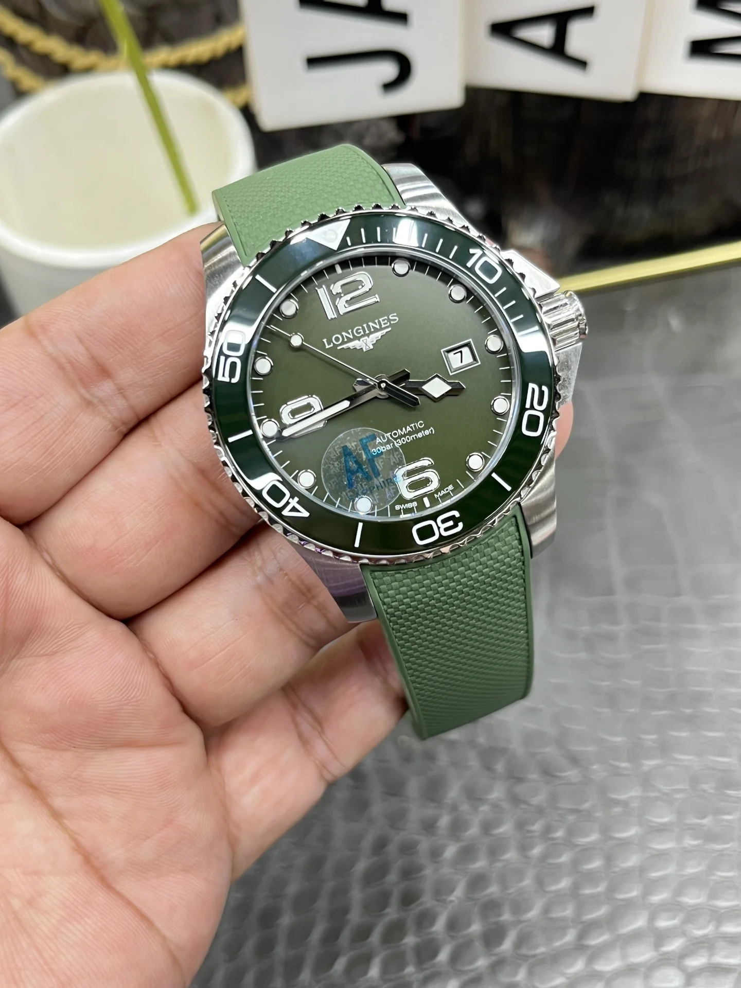 Longines Conquest Green Dial — photographed off the sweep