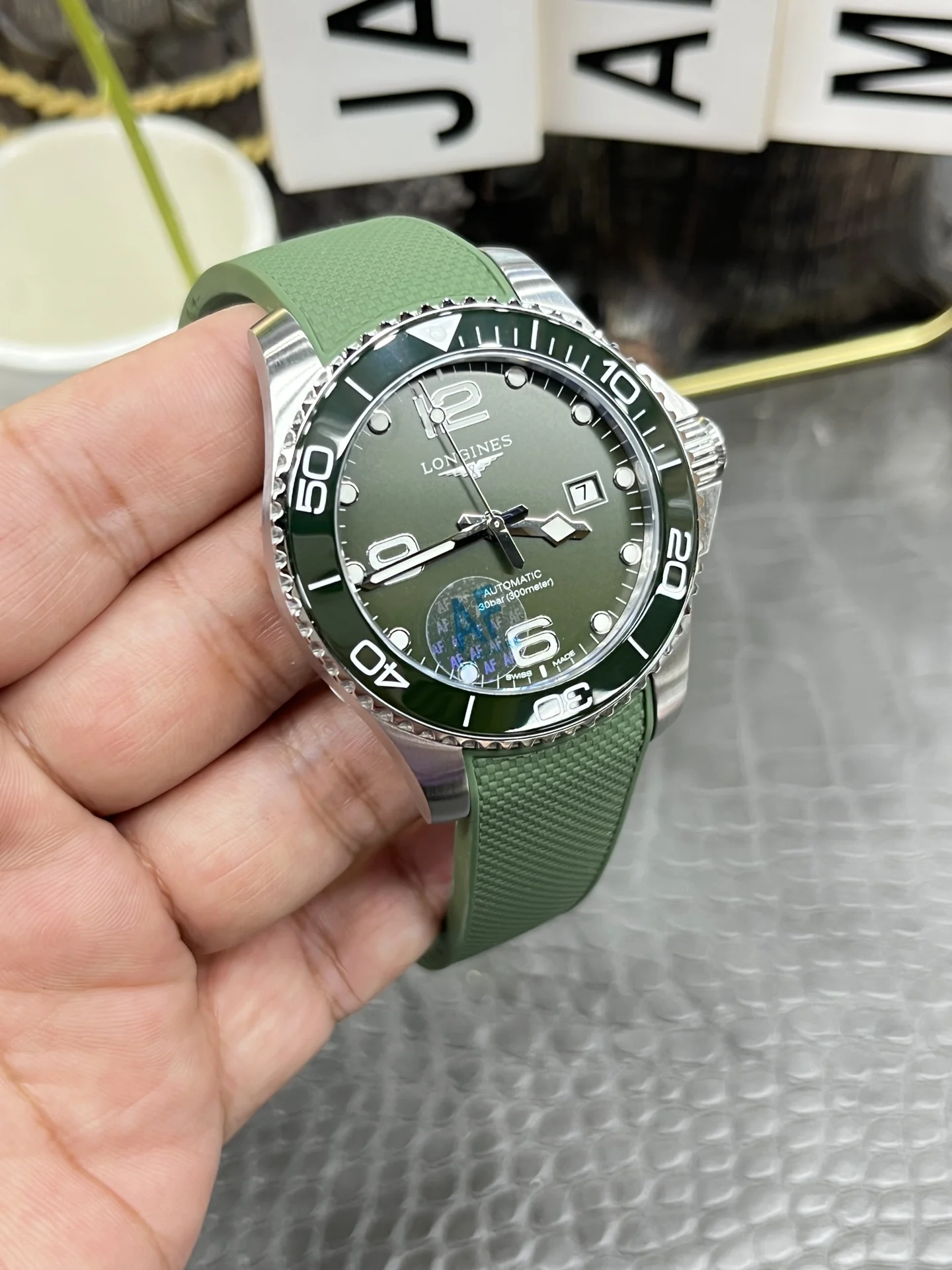 Longines Conquest Green Dial — photographed off the sweep