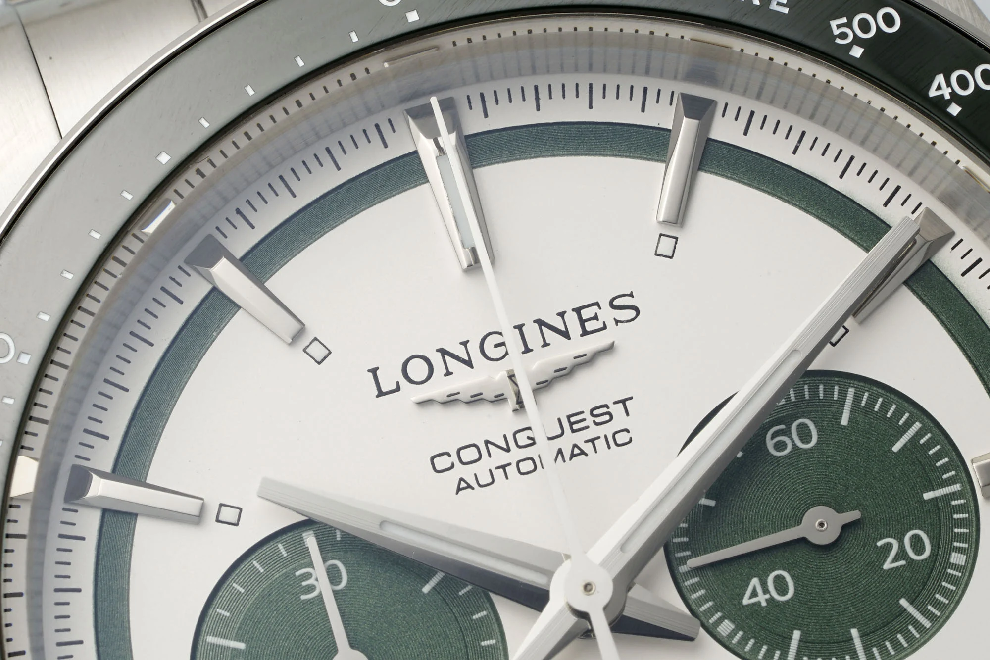 Longines Conquest Panda Ceramic Blue Dial 42.00mm — photographed off the sweep
