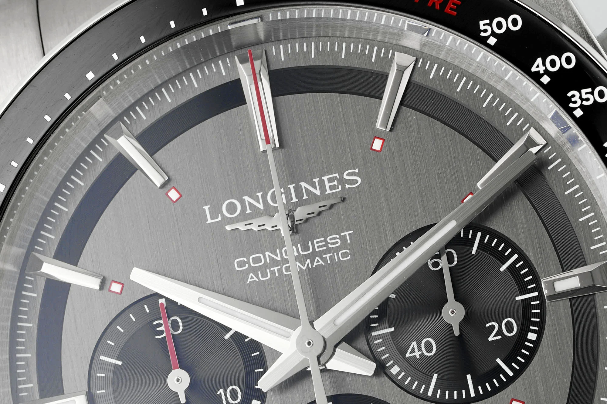 Longines Conquest Panda Ceramic Blue Dial 42.00mm — photographed off the sweep