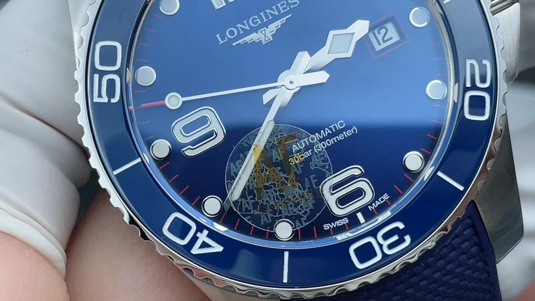 Longines Conquest Red Dial — photographed off the sweep