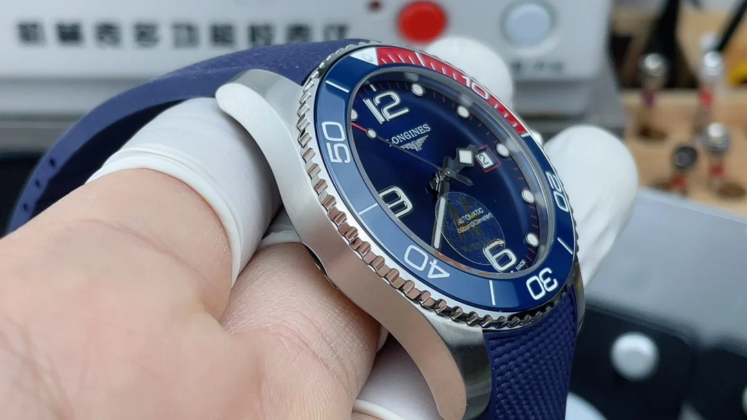 Longines Conquest Red Dial — photographed off the sweep