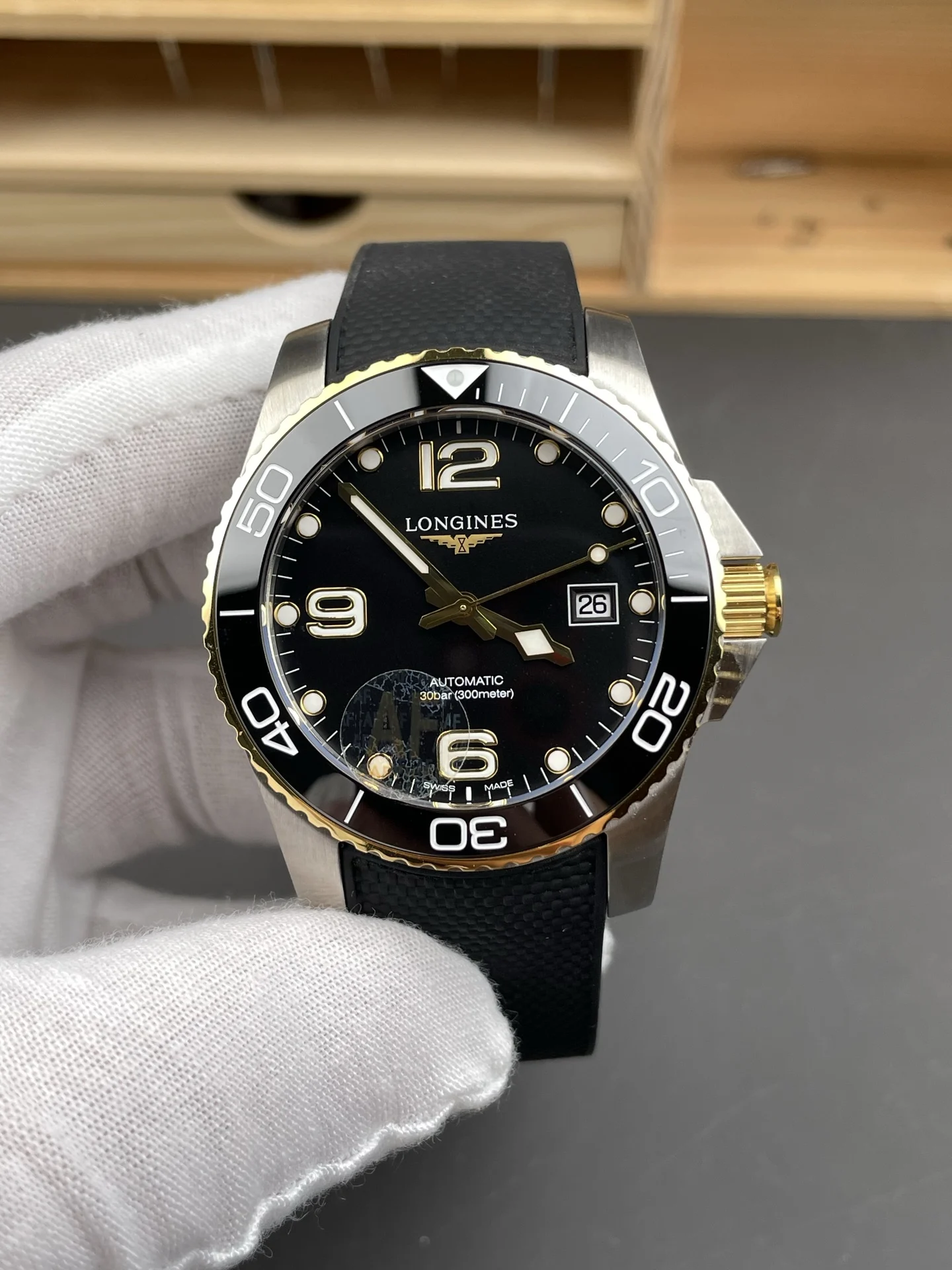 Longines Conquest Two-Tone Black Dial 41mm — photographed off the sweep