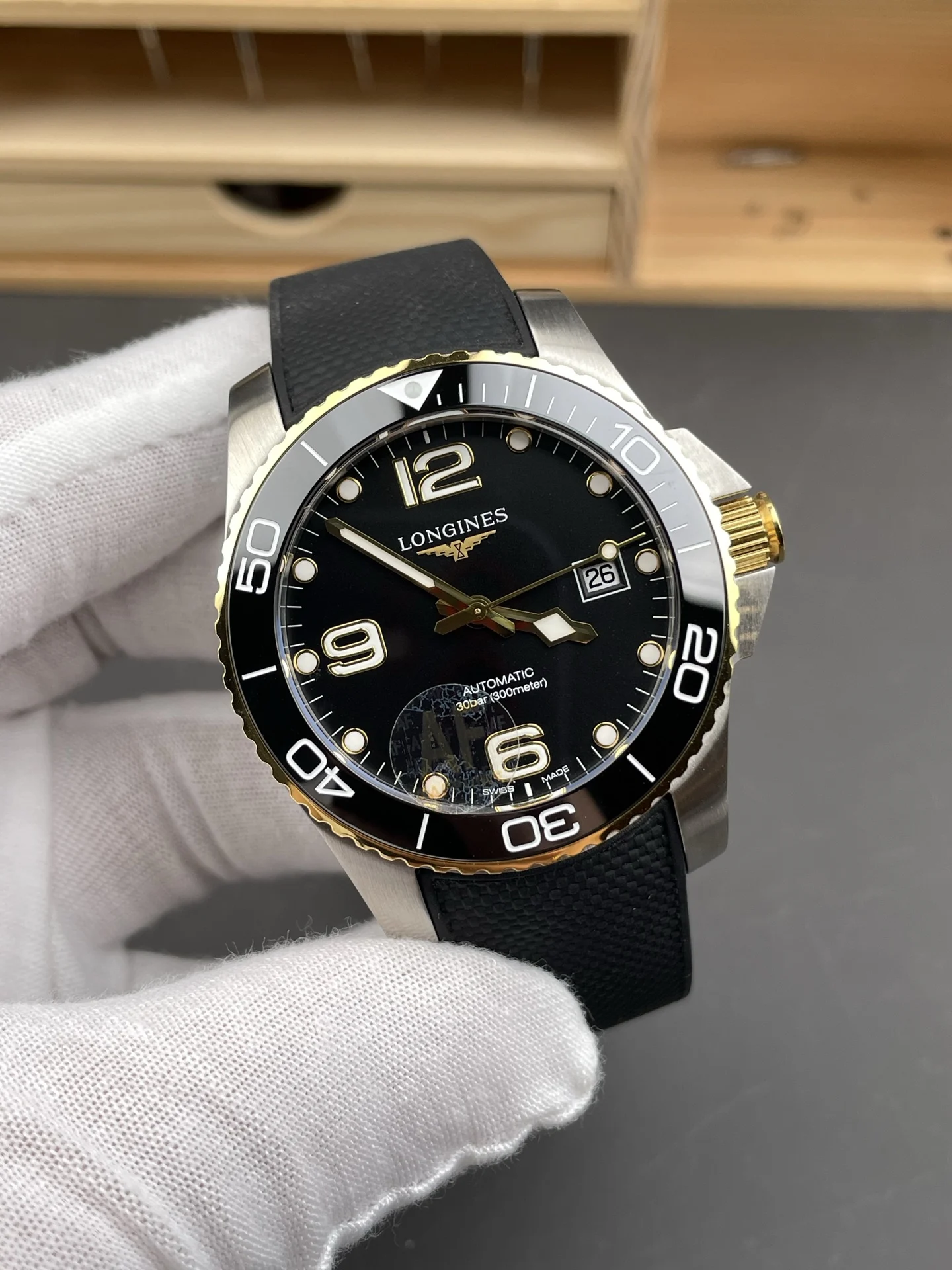 Longines Conquest Two-Tone Black Dial 41mm — photographed off the sweep
