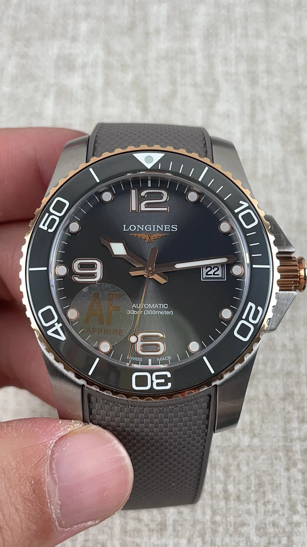 Longines Conquest Two-Tone — photographed off the sweep