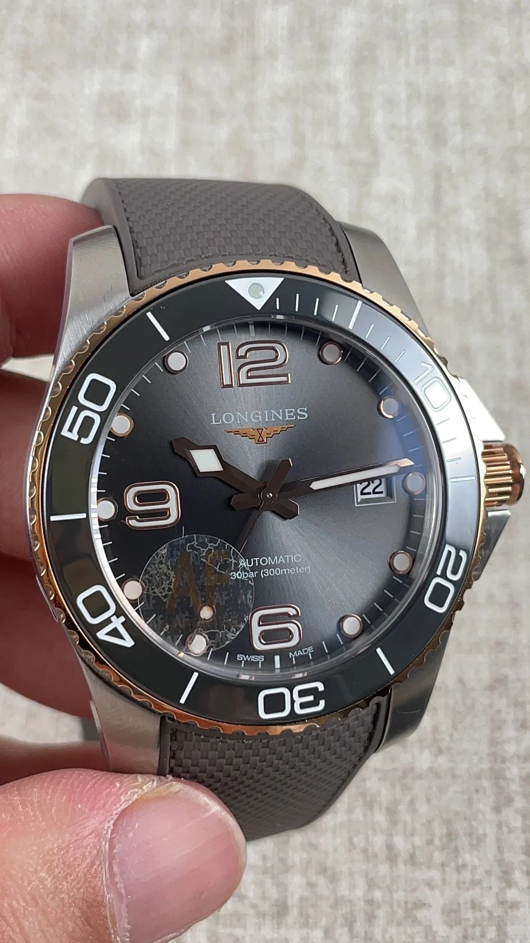 Longines Conquest Two-Tone — photographed off the sweep