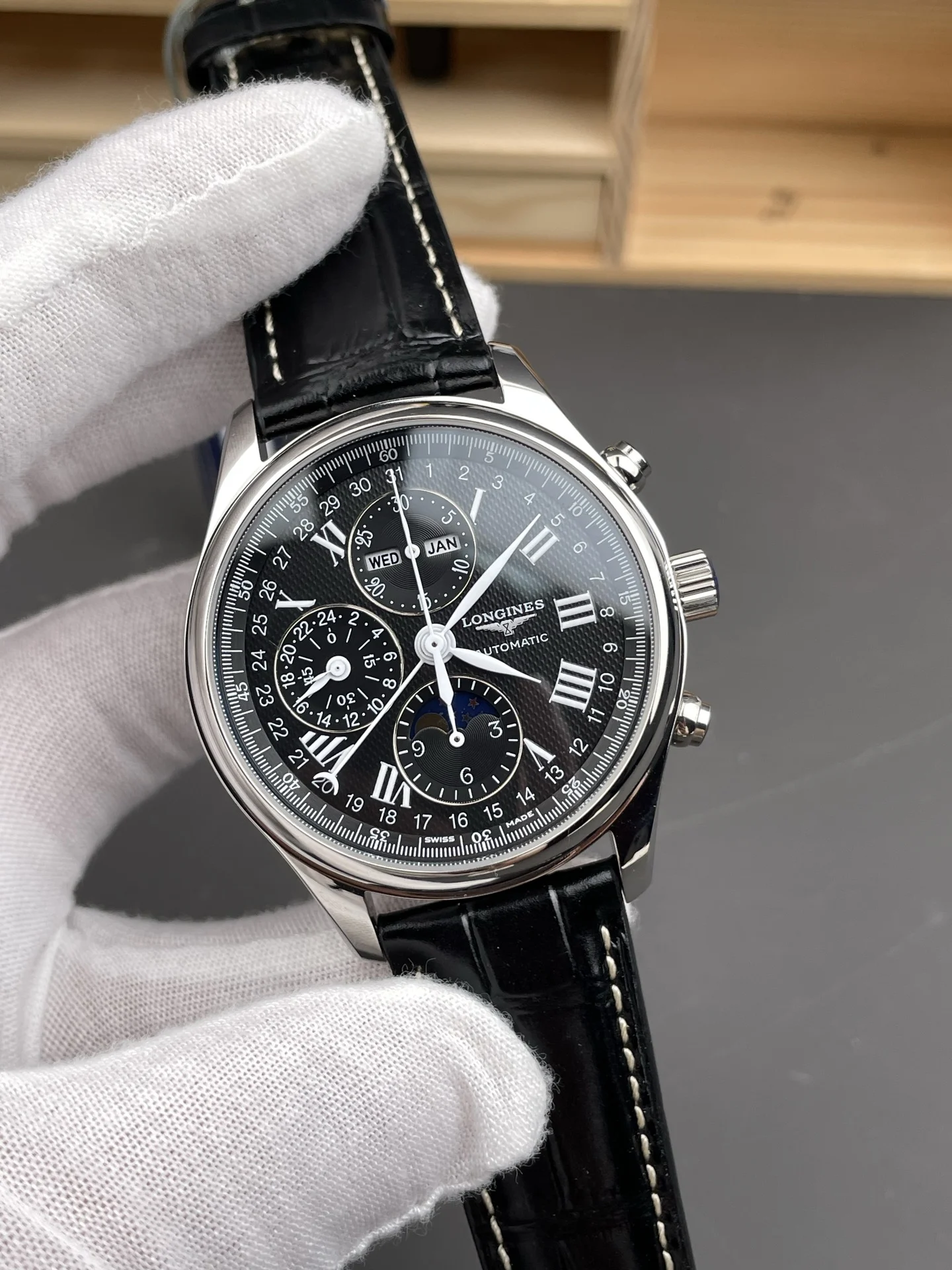 Longines Moon Phase Black Dial 42mm — photographed off the sweep