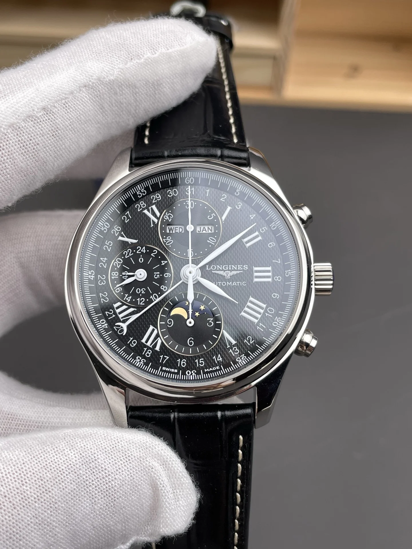 Longines Moon Phase Black Dial 42mm — photographed off the sweep