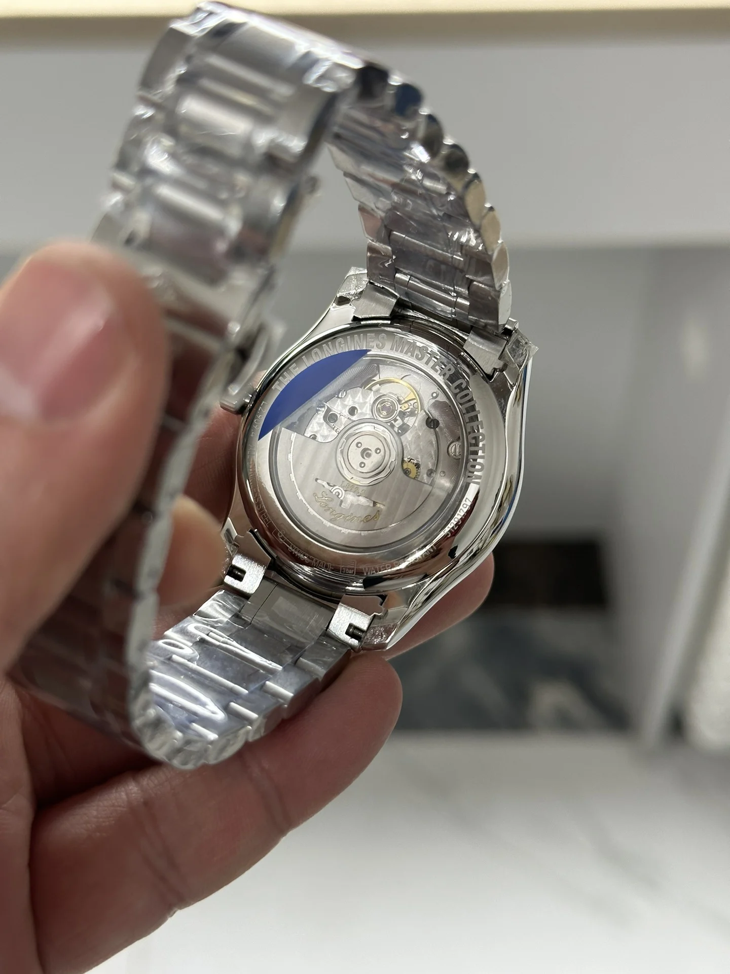 Longines Moon Phase Black Dial — photographed off the sweep