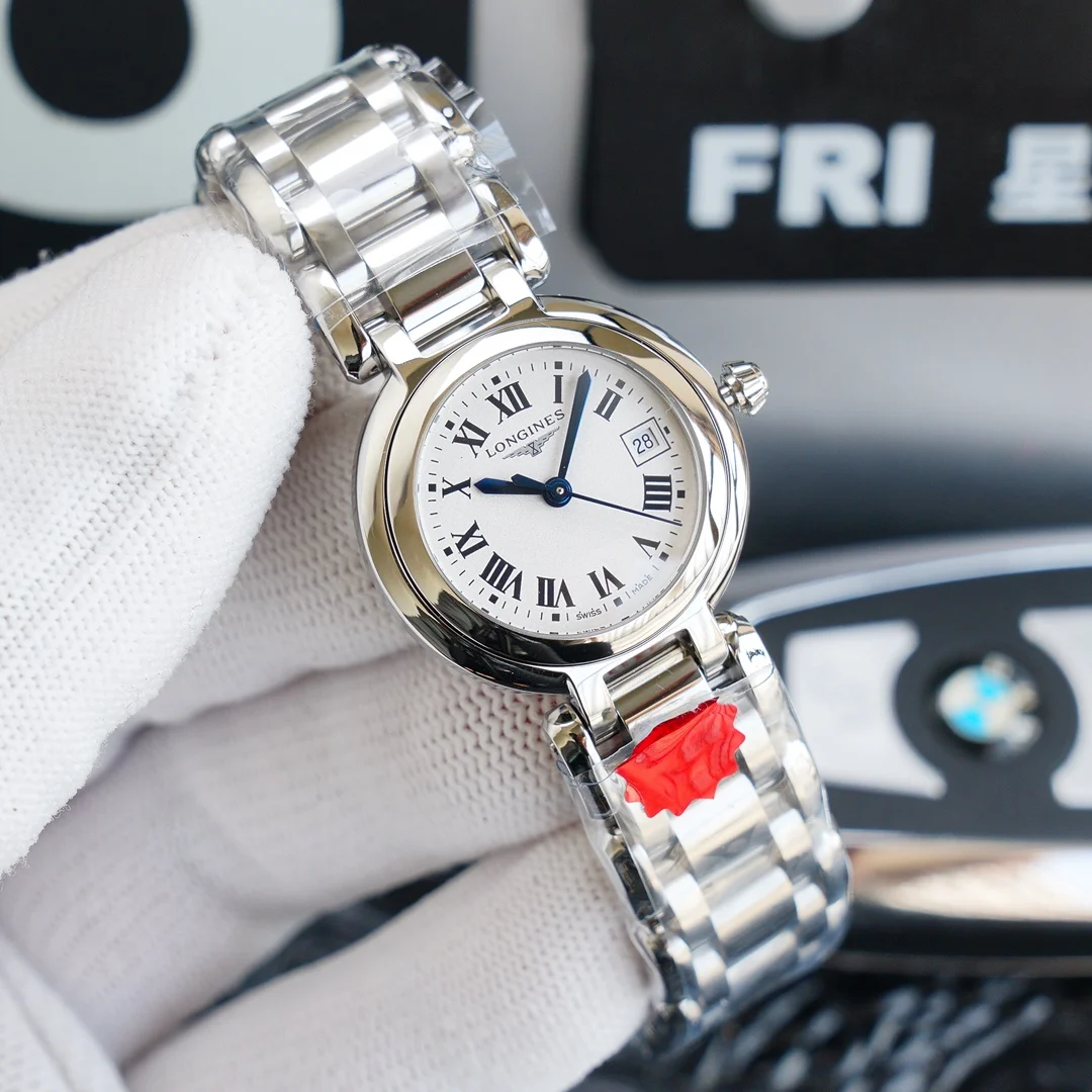 Longines Steel 26.5mm — photographed off the sweep