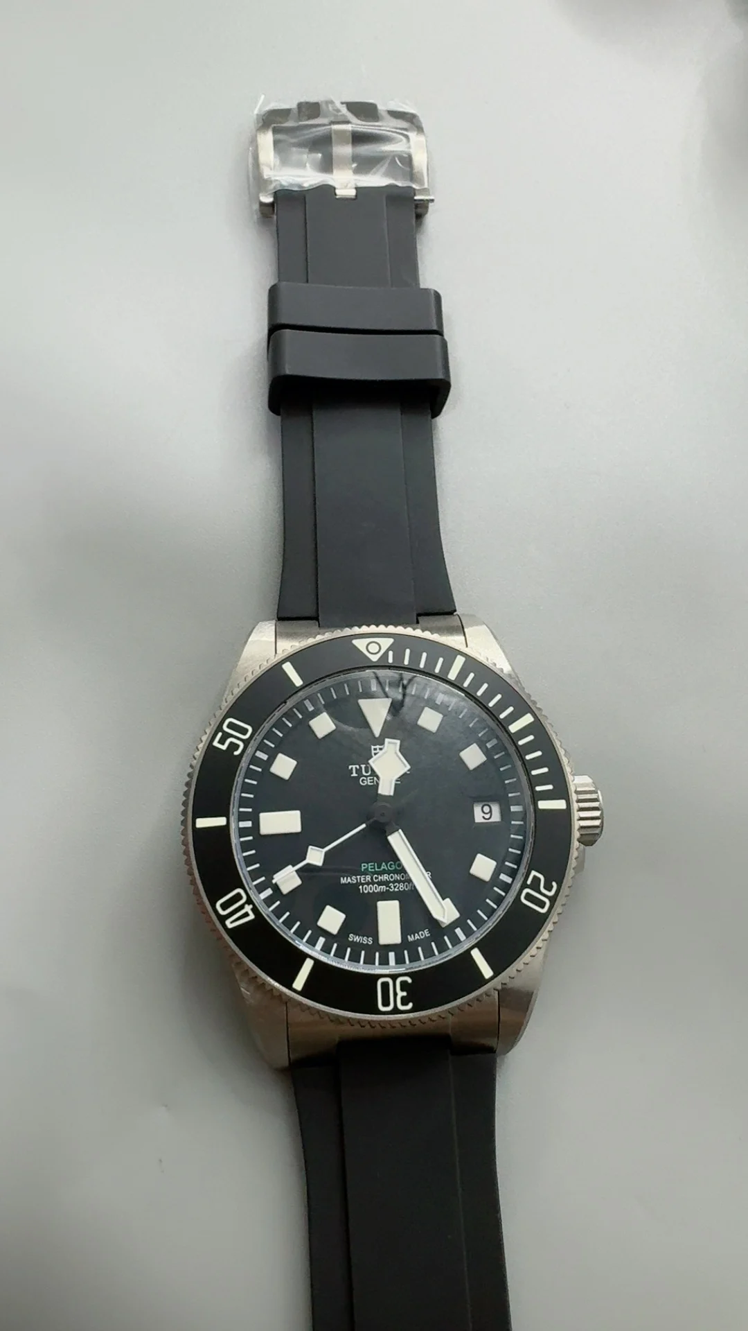 M+F, 43mm, titanium potato, free rubber — photographed off the sweep