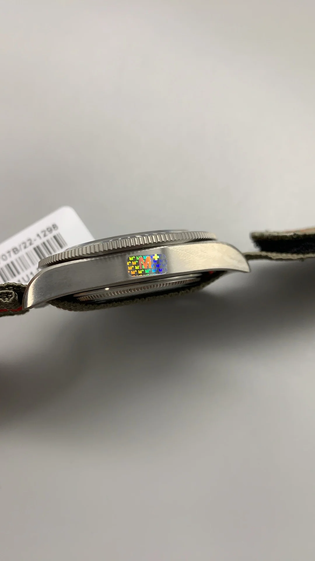 M+f, Tito, titanium, fabric tape — photographed off the sweep