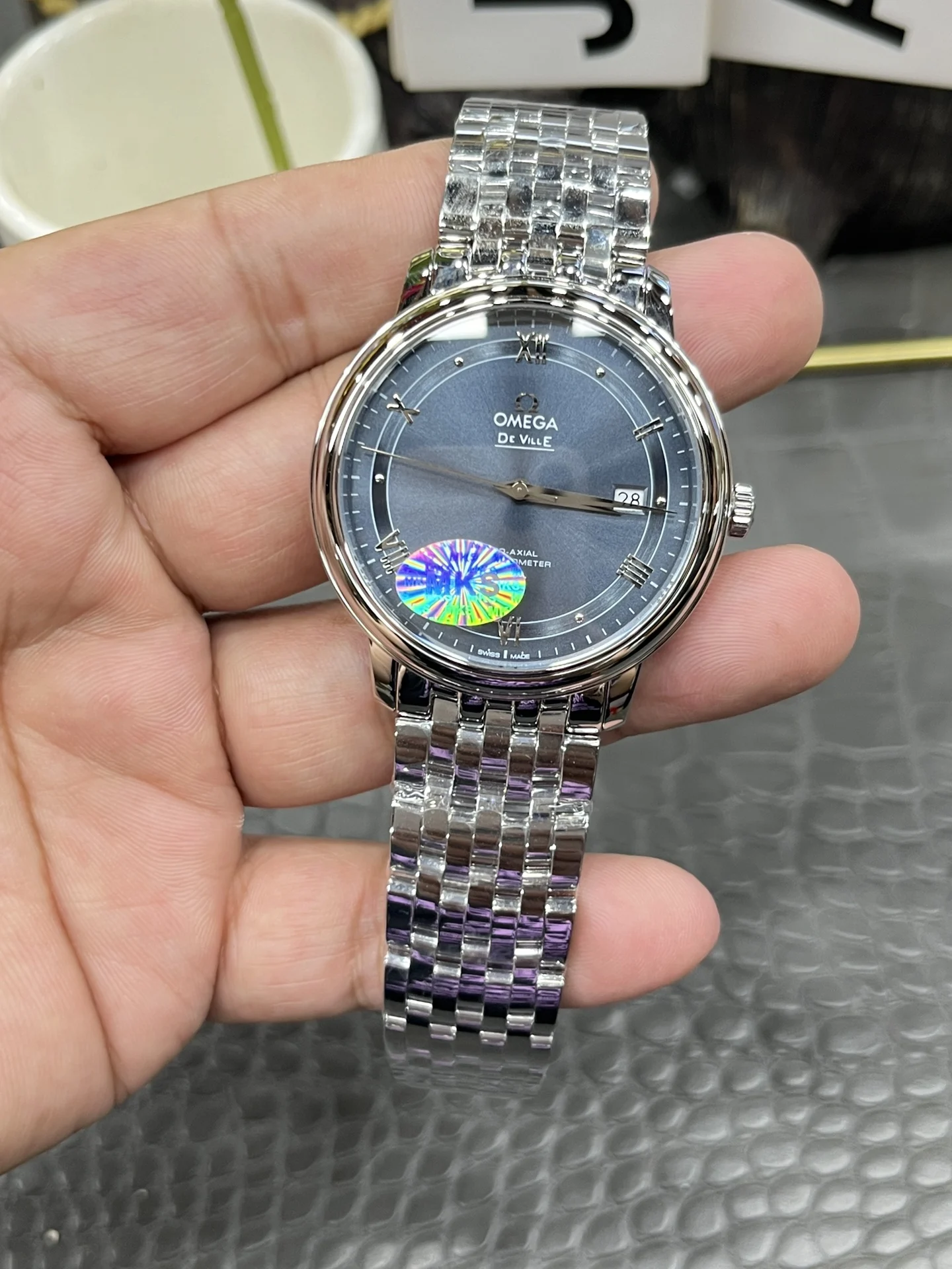 Omega 39.5mm — photographed off the sweep
