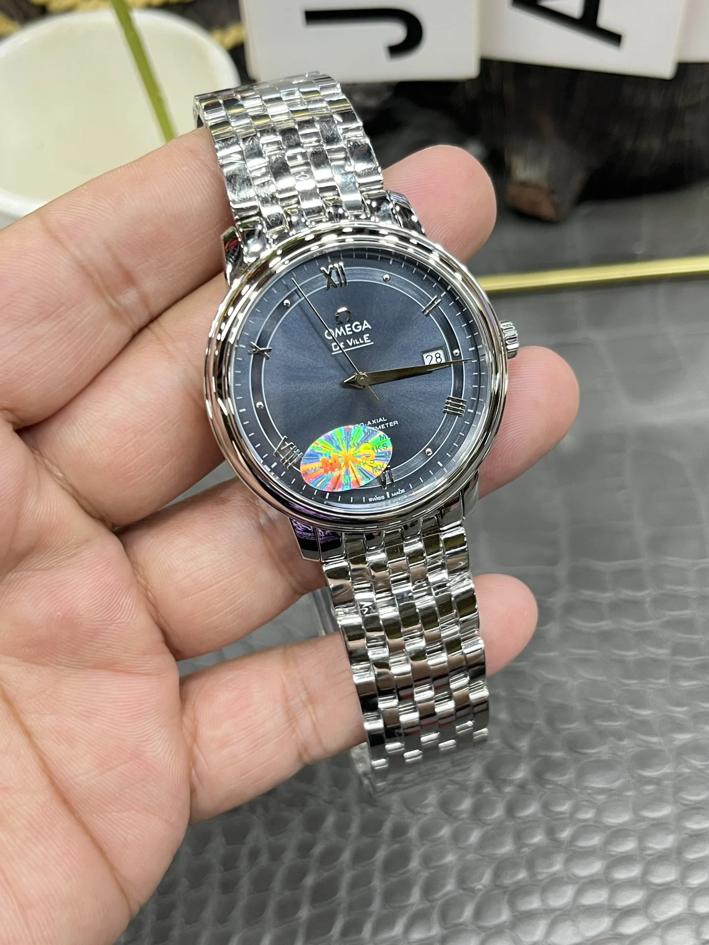 Omega 39.5mm — photographed off the sweep
