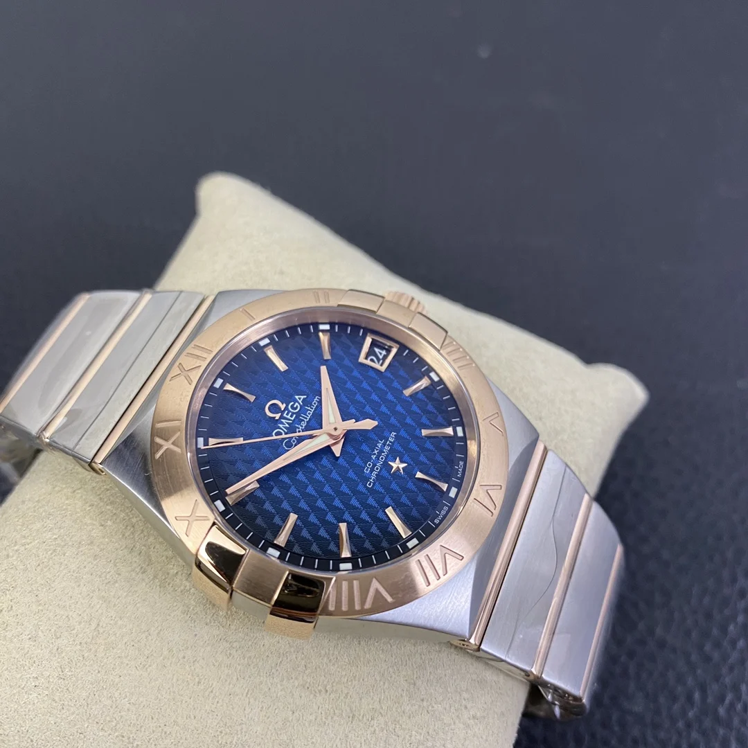 Omega Constellation Rose Gold Blue Dial 38mm — photographed off the sweep