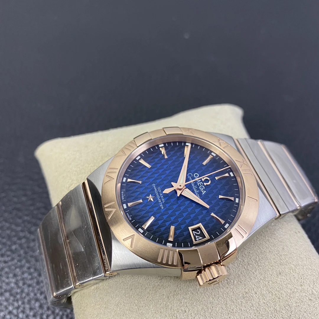 Omega Constellation Rose Gold Blue Dial 38mm — photographed off the sweep