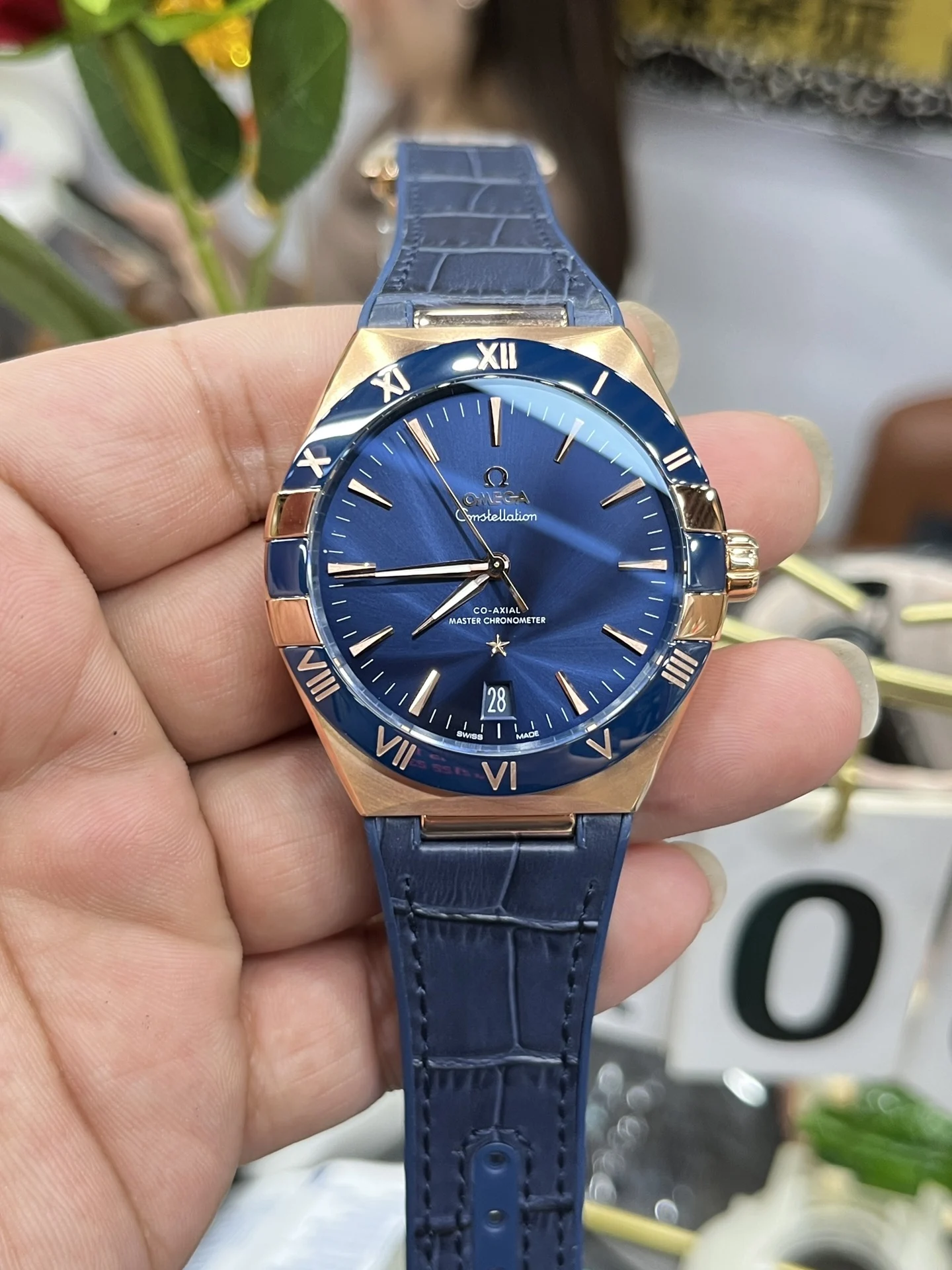 Omega Constellation Rose Gold Blue Dial 41mm — photographed off the sweep