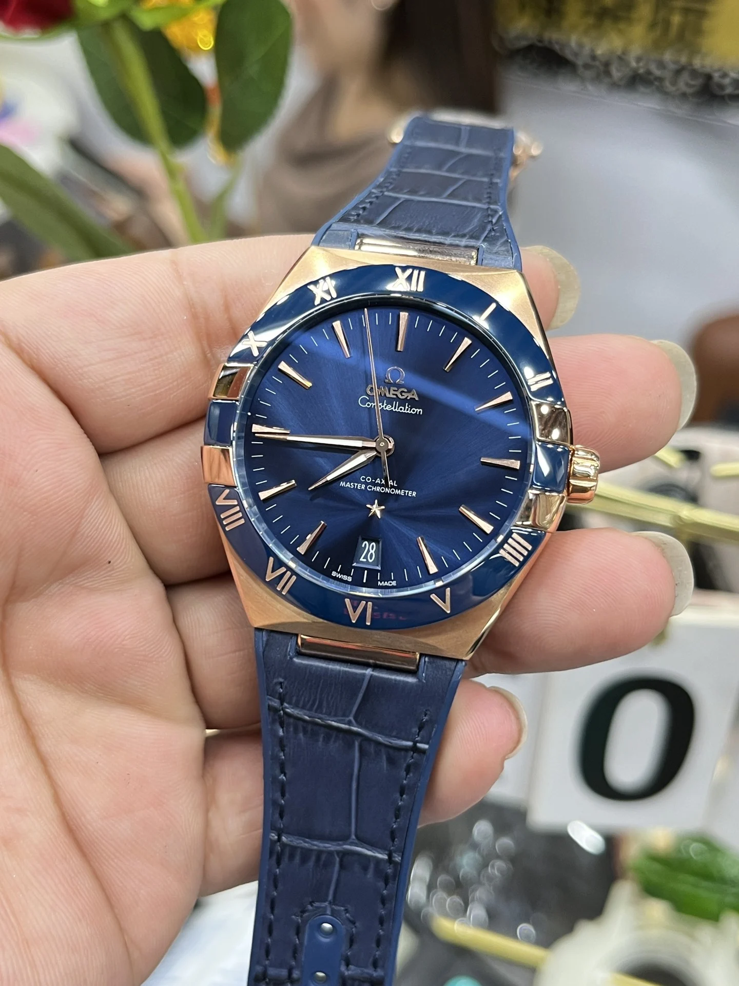 Omega Constellation Rose Gold Blue Dial 41mm — photographed off the sweep