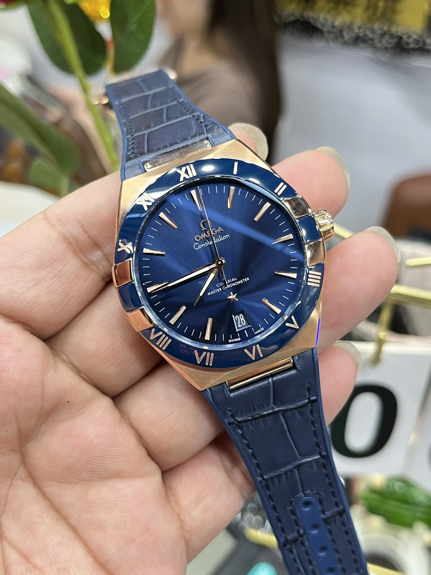 Omega Constellation Rose Gold Blue Dial 41mm — photographed off the sweep