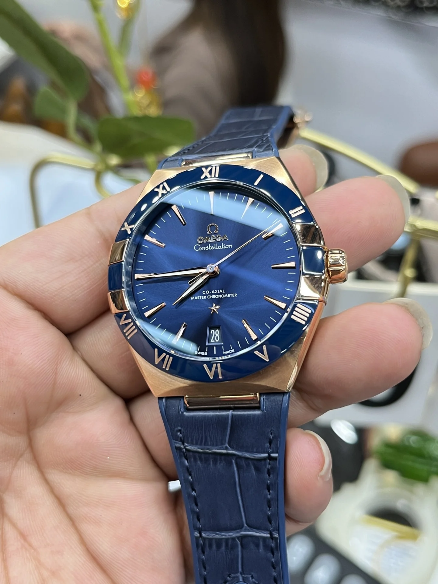 Omega Constellation Rose Gold Blue Dial 41mm — photographed off the sweep