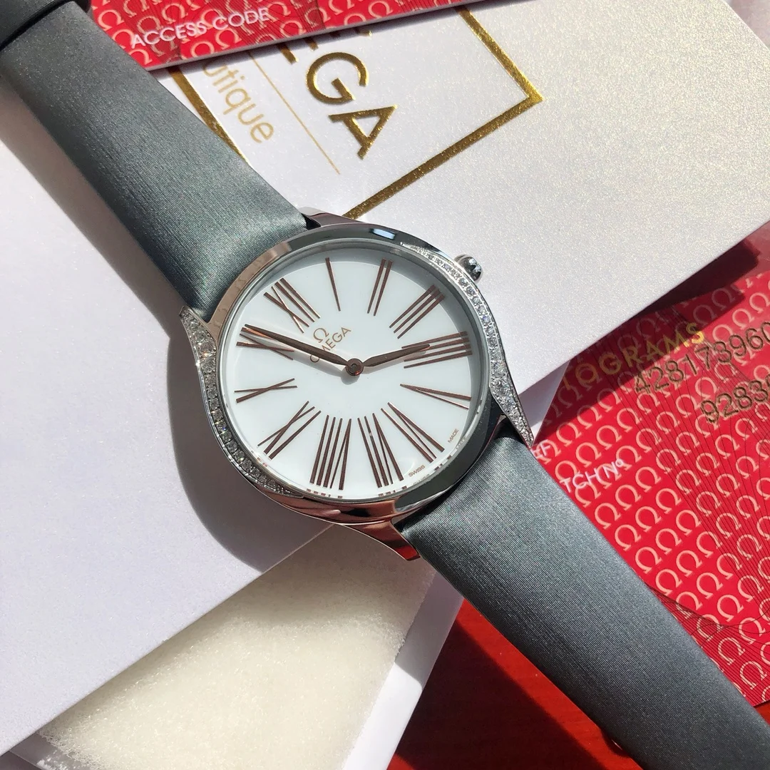 Omega De Ville Ceramic Red Dial 36mm — photographed off the sweep