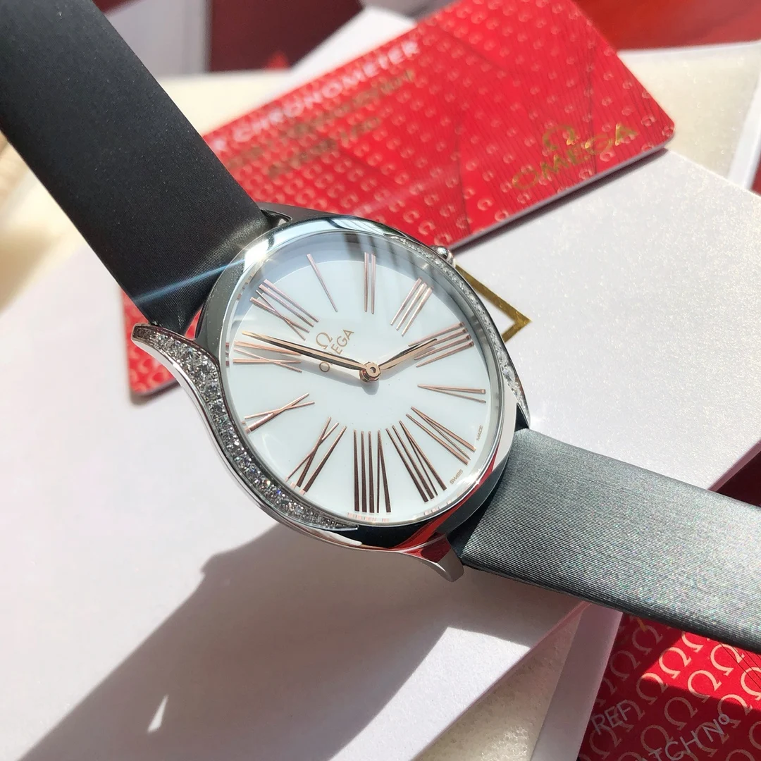 Omega De Ville Ceramic Red Dial 36mm — photographed off the sweep
