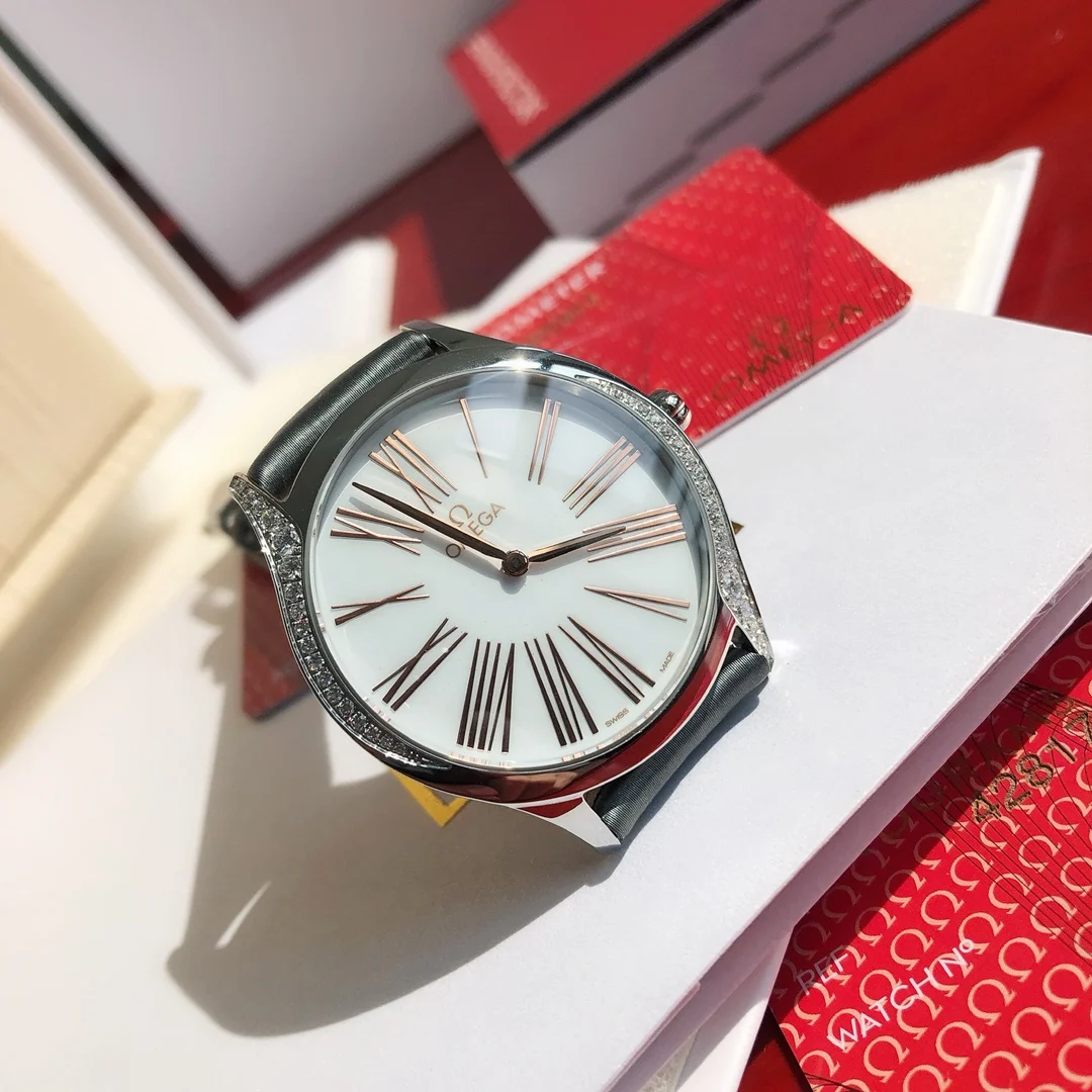 Omega De Ville Ceramic Red Dial 36mm — photographed off the sweep
