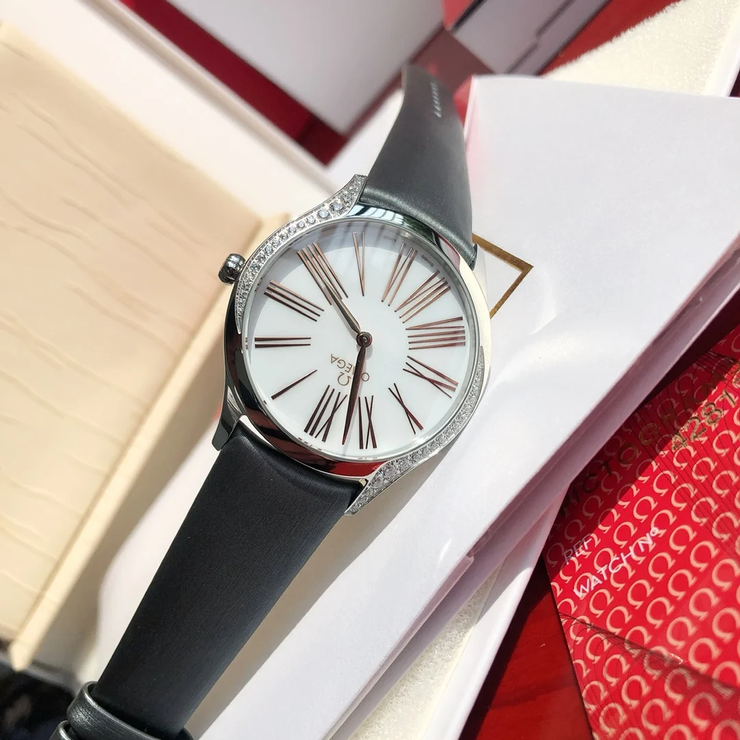 Omega De Ville Ceramic Red Dial 36mm — photographed off the sweep