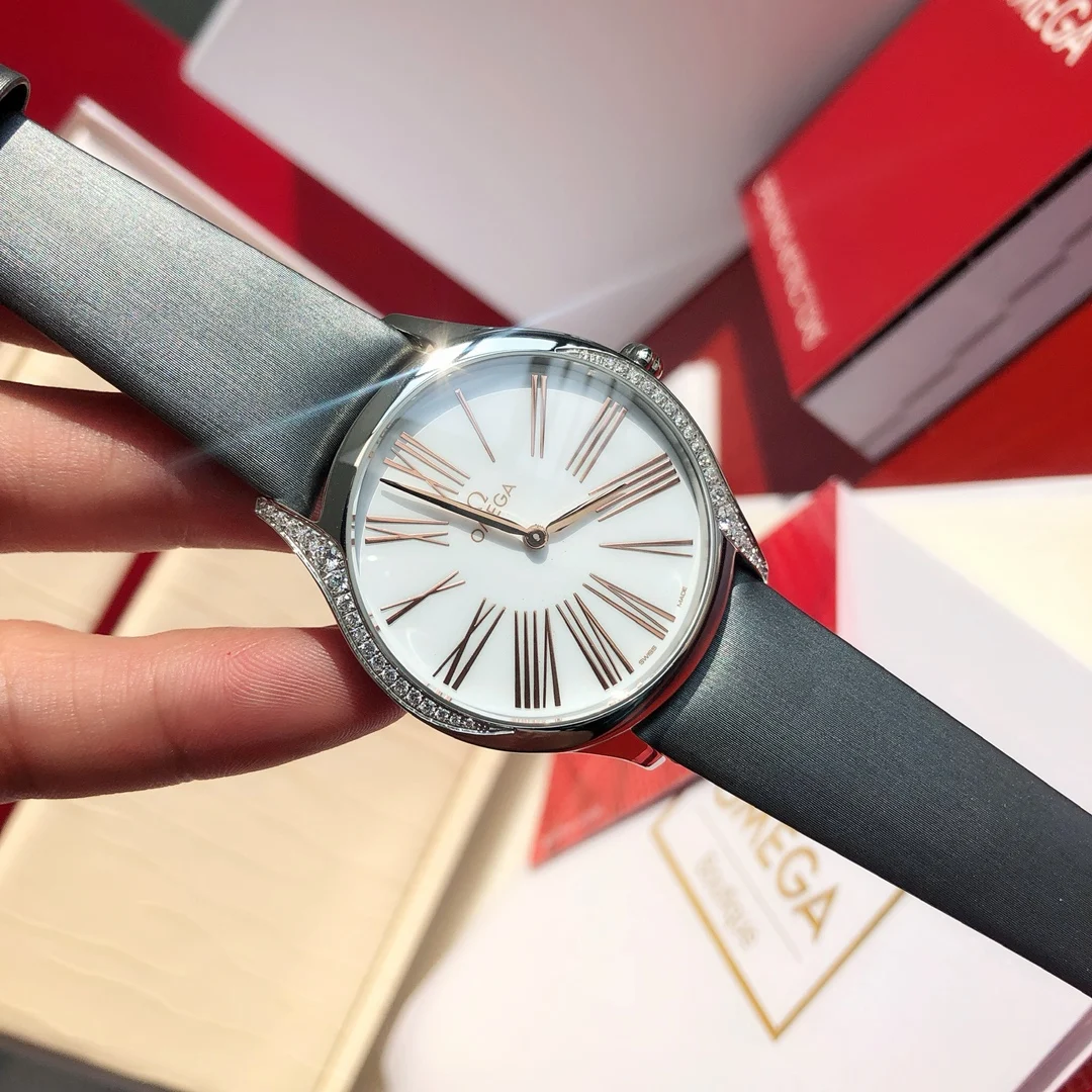 Omega De Ville Ceramic Red Dial 36mm — photographed off the sweep