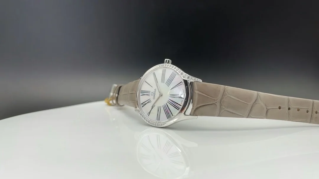 Omega De Ville Ceramic Red Dial Diamond-Set — photographed off the sweep