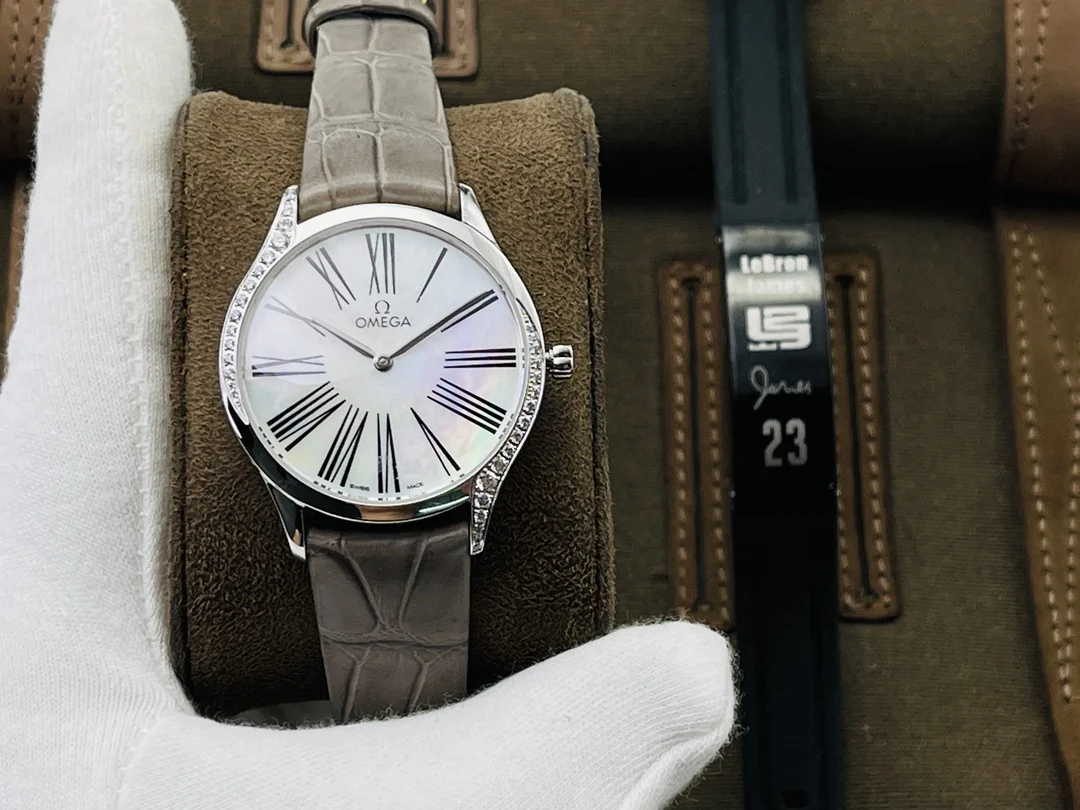 Omega De Ville Ceramic Red Dial Diamond-Set — photographed off the sweep