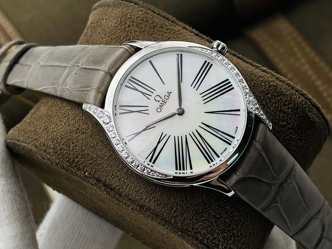 Omega De Ville Ceramic Red Dial Diamond-Set — photographed off the sweep